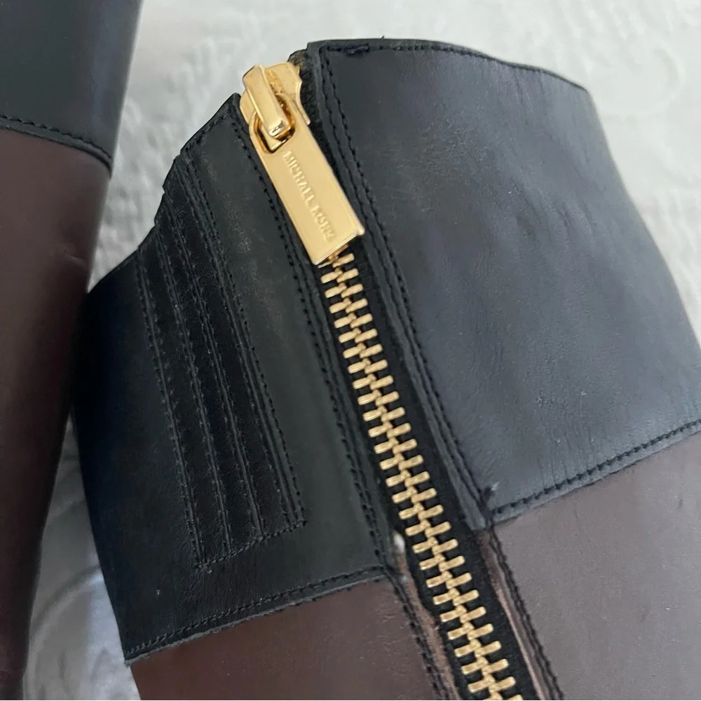 Michael Kors Black and Brown Leather Knee Boots with Gold hardware. Size 6